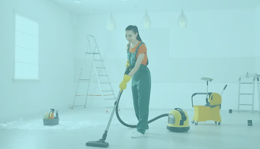 Female cleaner performing post-construction cleaning.
